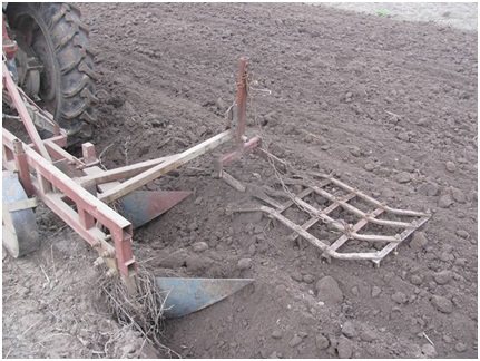 Plow L-101 with an adapted harrow